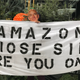 Illustration for article titled Dozens of Jeff Bezoses Protest Amazon's Continued Relationship With ICE